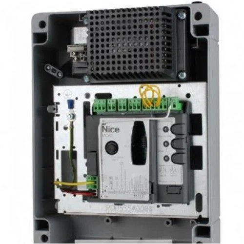 Nice MC424L swing gate control unit in an open enclosure with terminals, wiring and protected modules.
