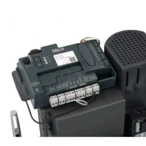 Nice MCU1 control unit mounted inside a compatible ROBUS sliding gate motor with visible terminal connections.