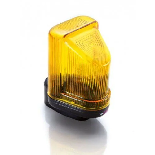 TAU LAMP 900LAMP2 LED gate flashing light with amber ribbed cover and black mounting base.