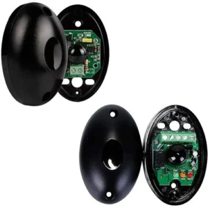 Open black universal infrared gate sensors showing internal circuit boards for automatic gate safety and access control.