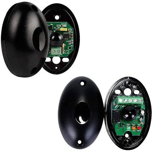 Open black universal infrared gate sensors showing internal circuit boards for automatic gate safety and access control.