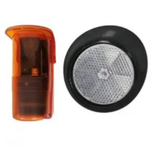 Wireless reflective gate photocell sensor with orange housing and round reflector on white.